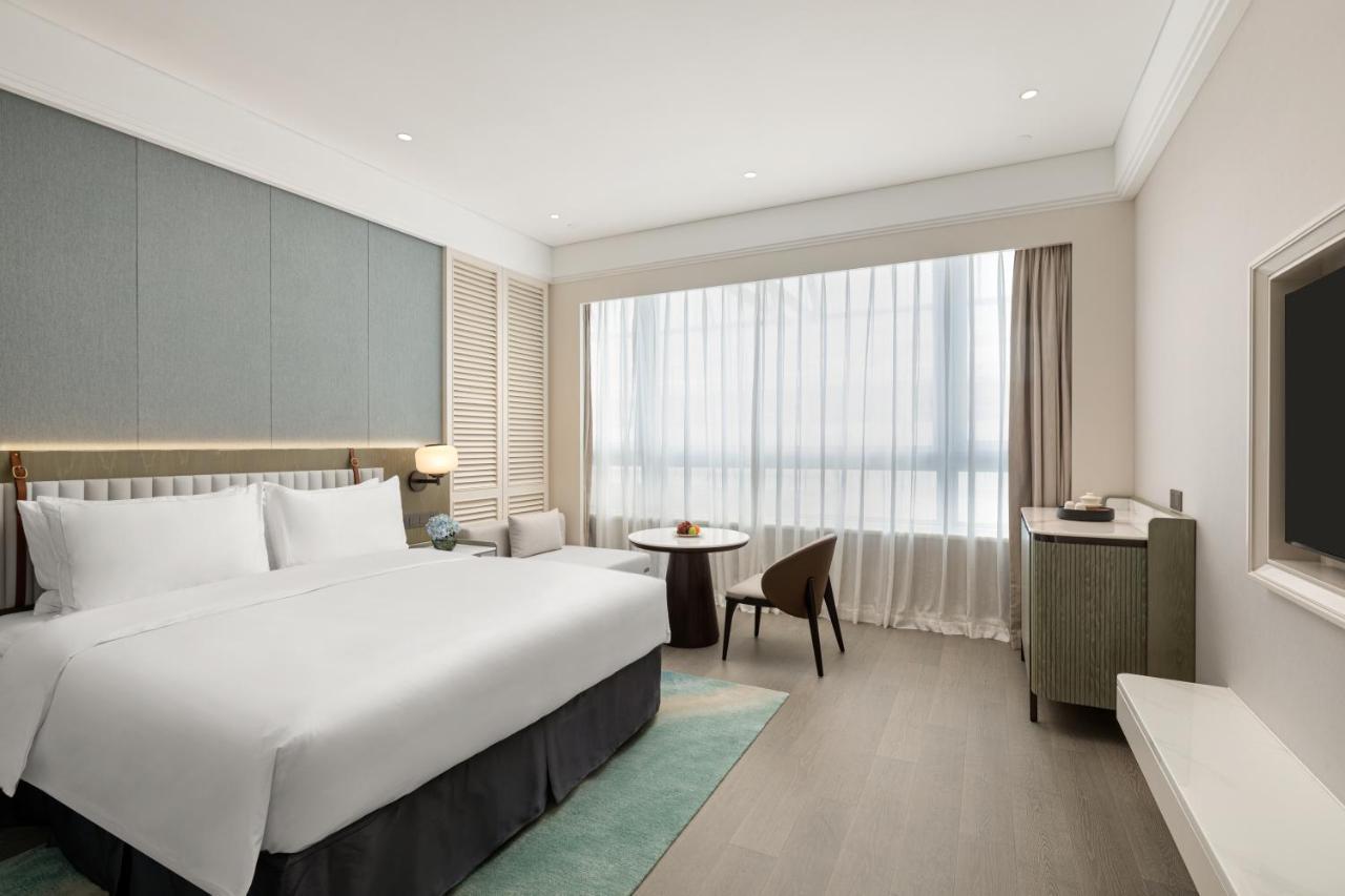 Xiamen International Seaside Hotel -Hotel Corridor Leads To The Stone Exhibition Hall Buitenkant foto