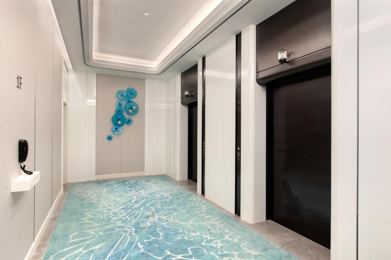 Xiamen International Seaside Hotel -Hotel Corridor Leads To The Stone Exhibition Hall Buitenkant foto