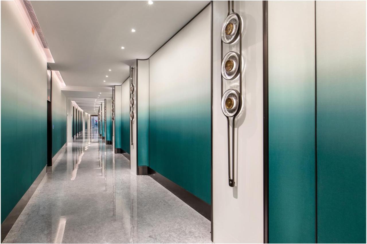 Xiamen International Seaside Hotel -Hotel Corridor Leads To The Stone Exhibition Hall Buitenkant foto