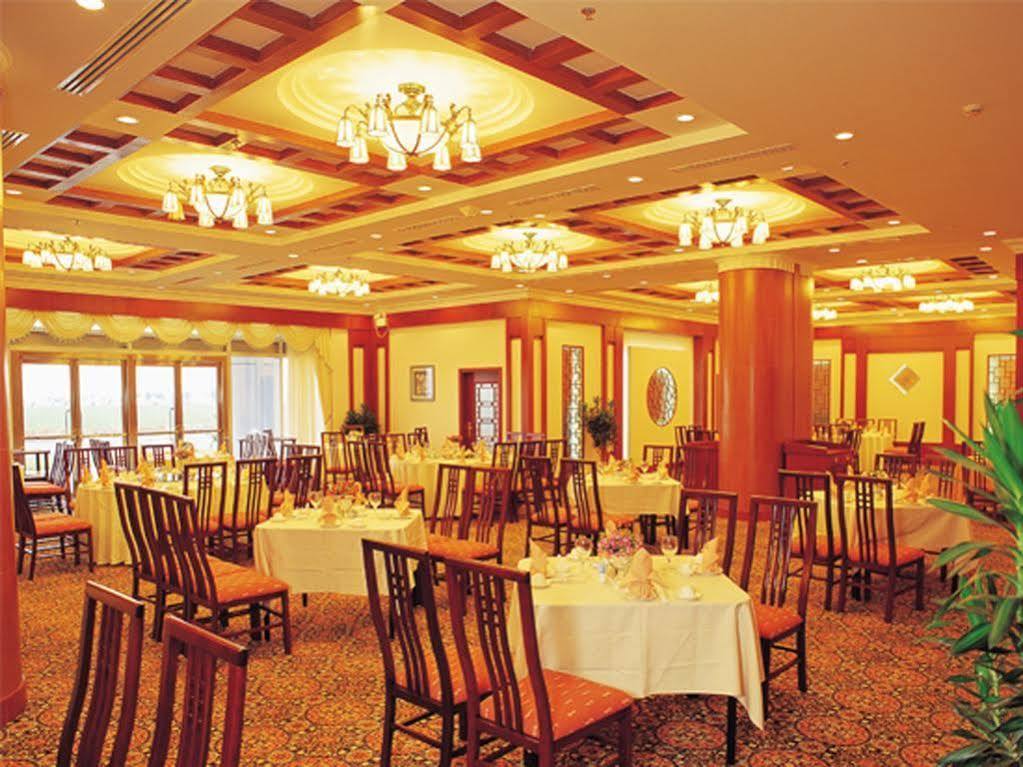 Xiamen International Seaside Hotel -Hotel Corridor Leads To The Stone Exhibition Hall Buitenkant foto